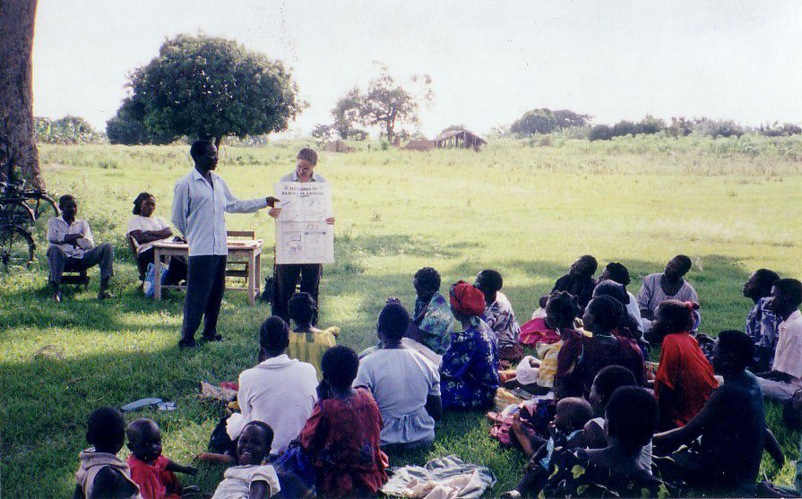 Village gathering with a presentation